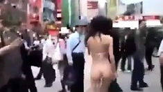 Walking Semi-nude In Tokyo Streets